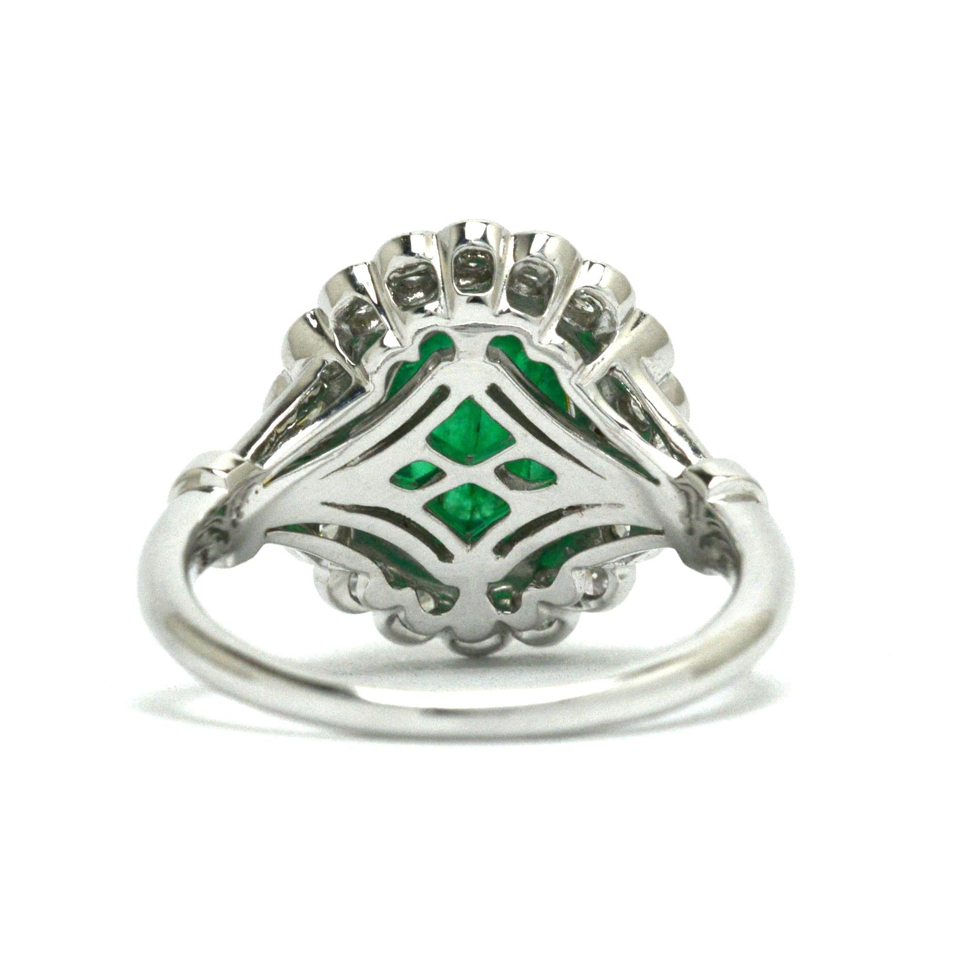 A white gold Edwardian emerald cocktail ring.