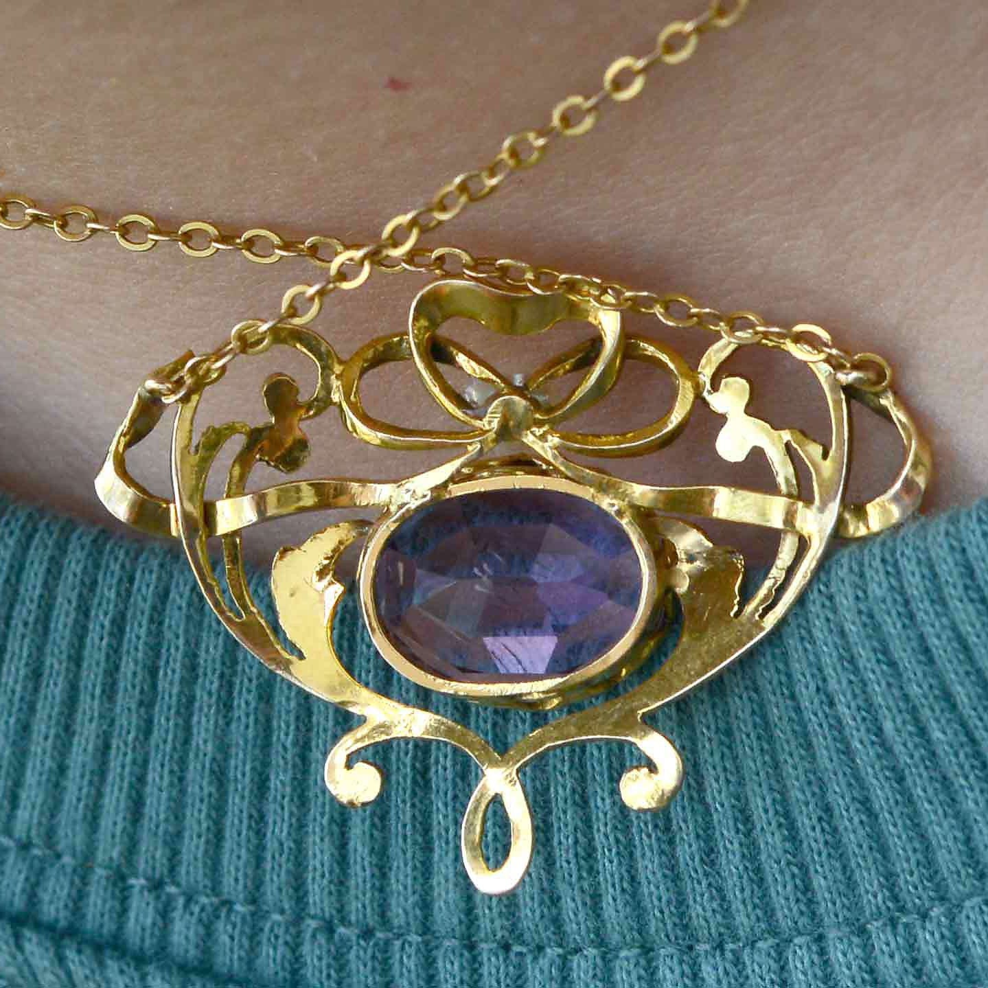 With scrolling, flowing vines, this is an authentic antique Art Nouveau amethyst necklace.