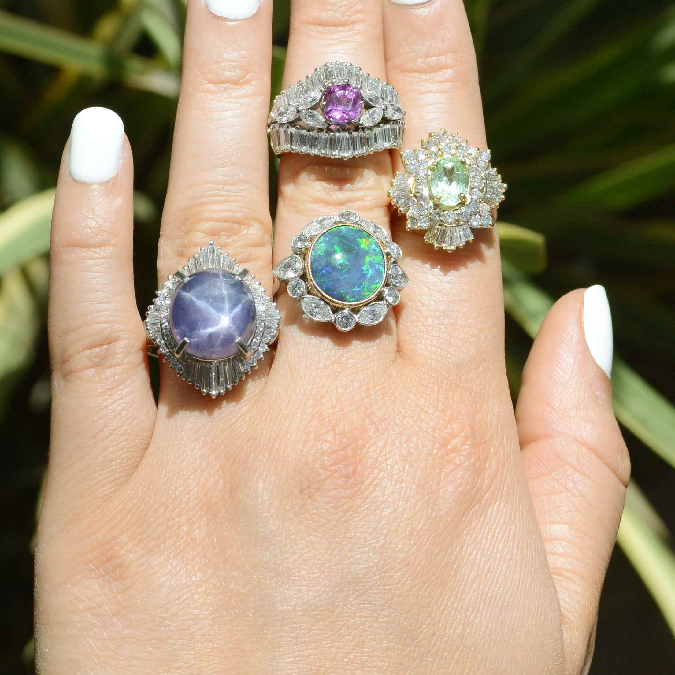 Some large gemstone and diamond cocktail rings available from our estate jewelry store.