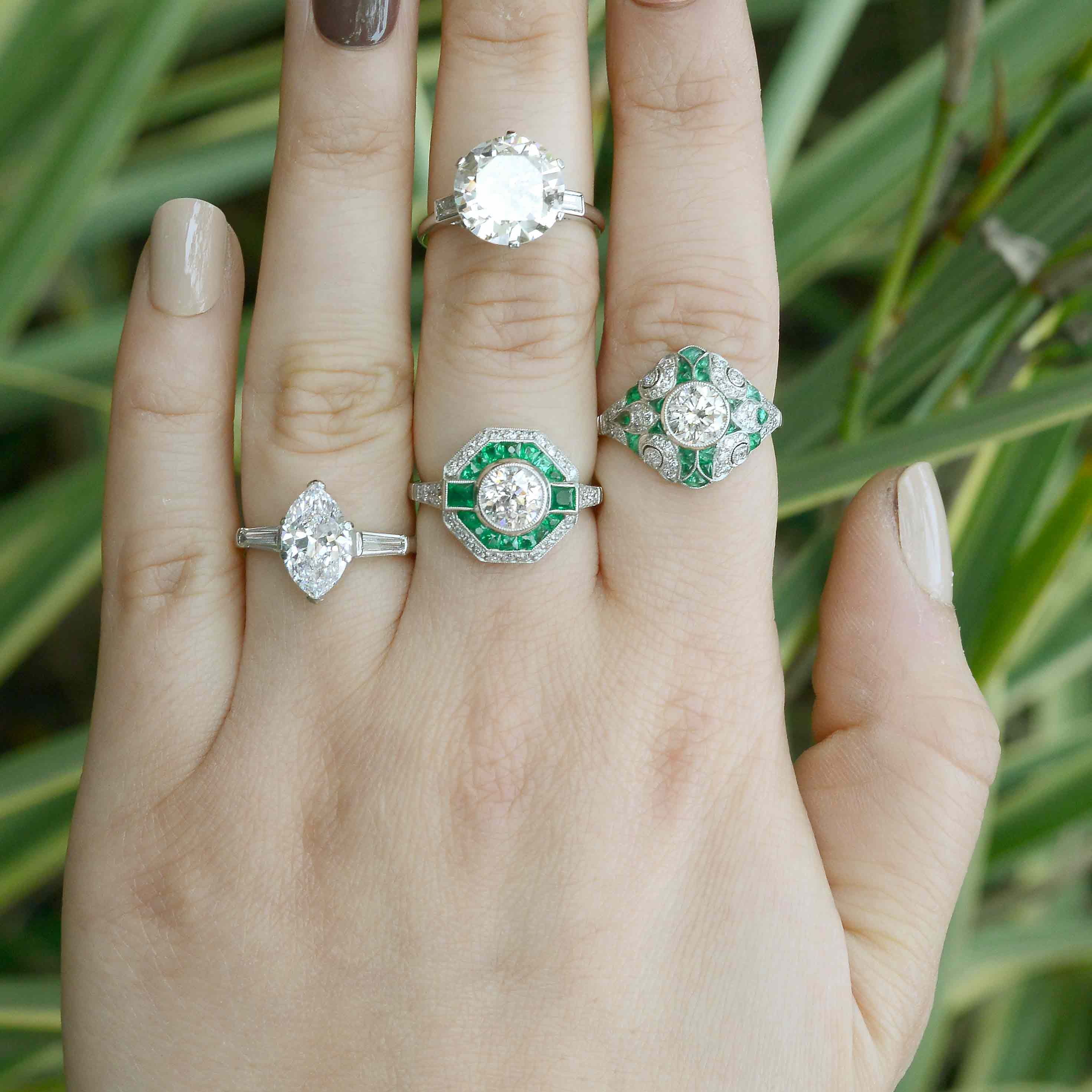 Some diamond and emerald engagment rings available from our gallery.