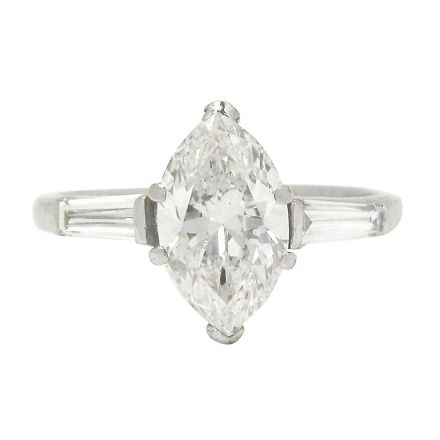 An over 2 carat marquise cut center diamond, antique engagement ring.