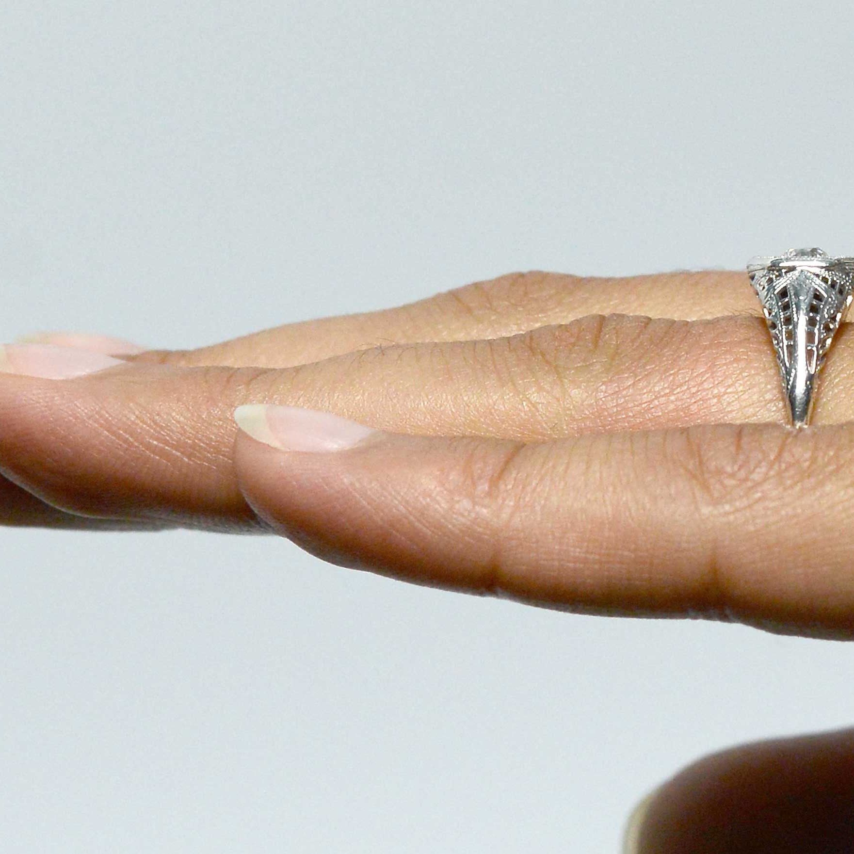 A tapered filigree band on an Edwardian wedding ring.