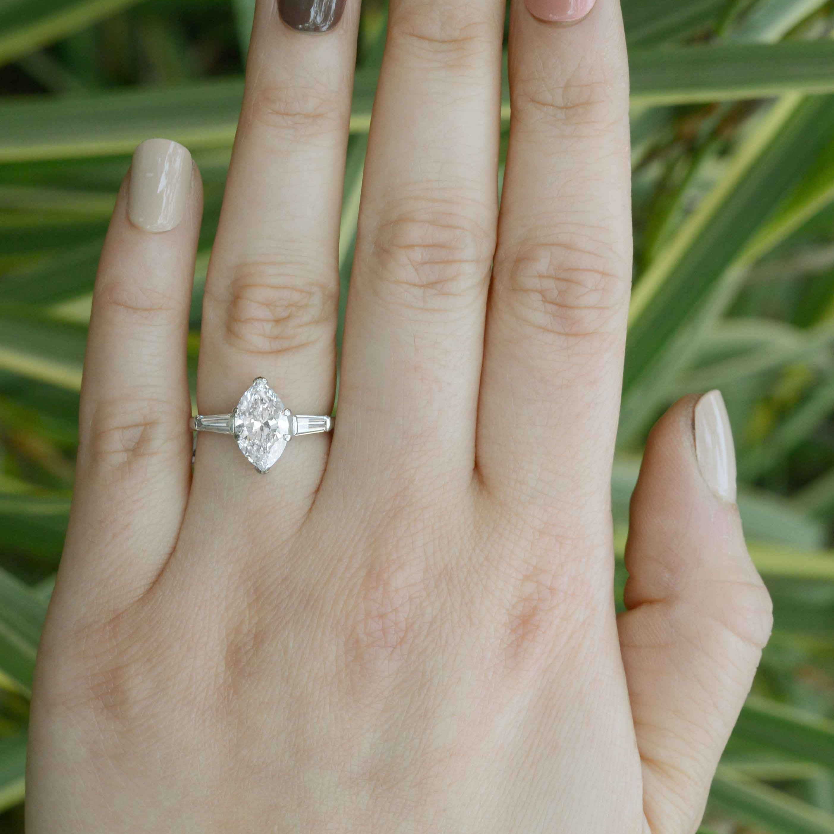 A good proportion, unique 2 carat marquise diamond engagement ring.