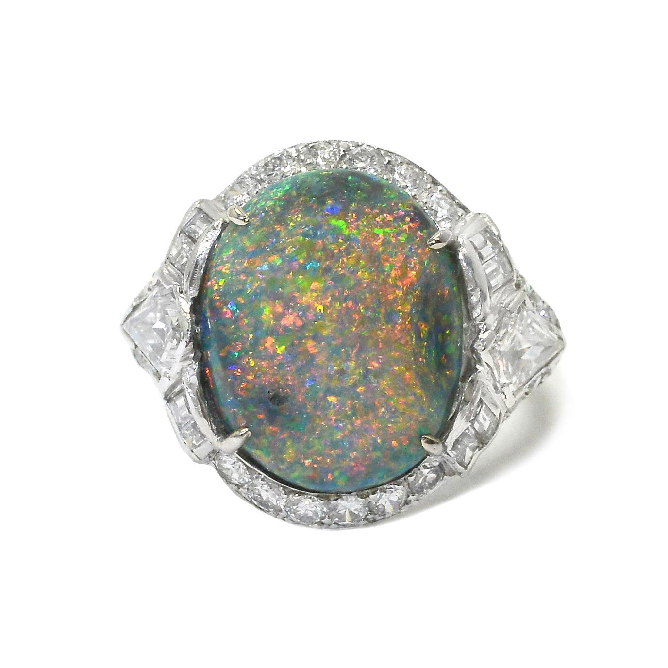 An oval Australian black opal ring, presented in one of our vintage ring boxes.