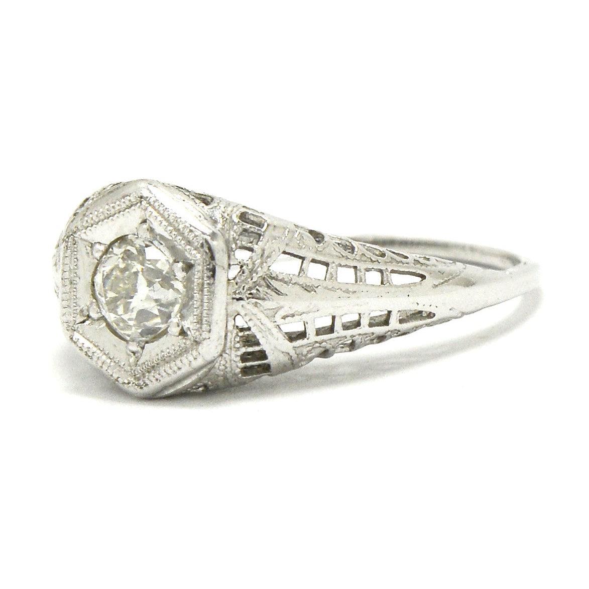 An old mine diamond set in an Edwardian solitaire ring.