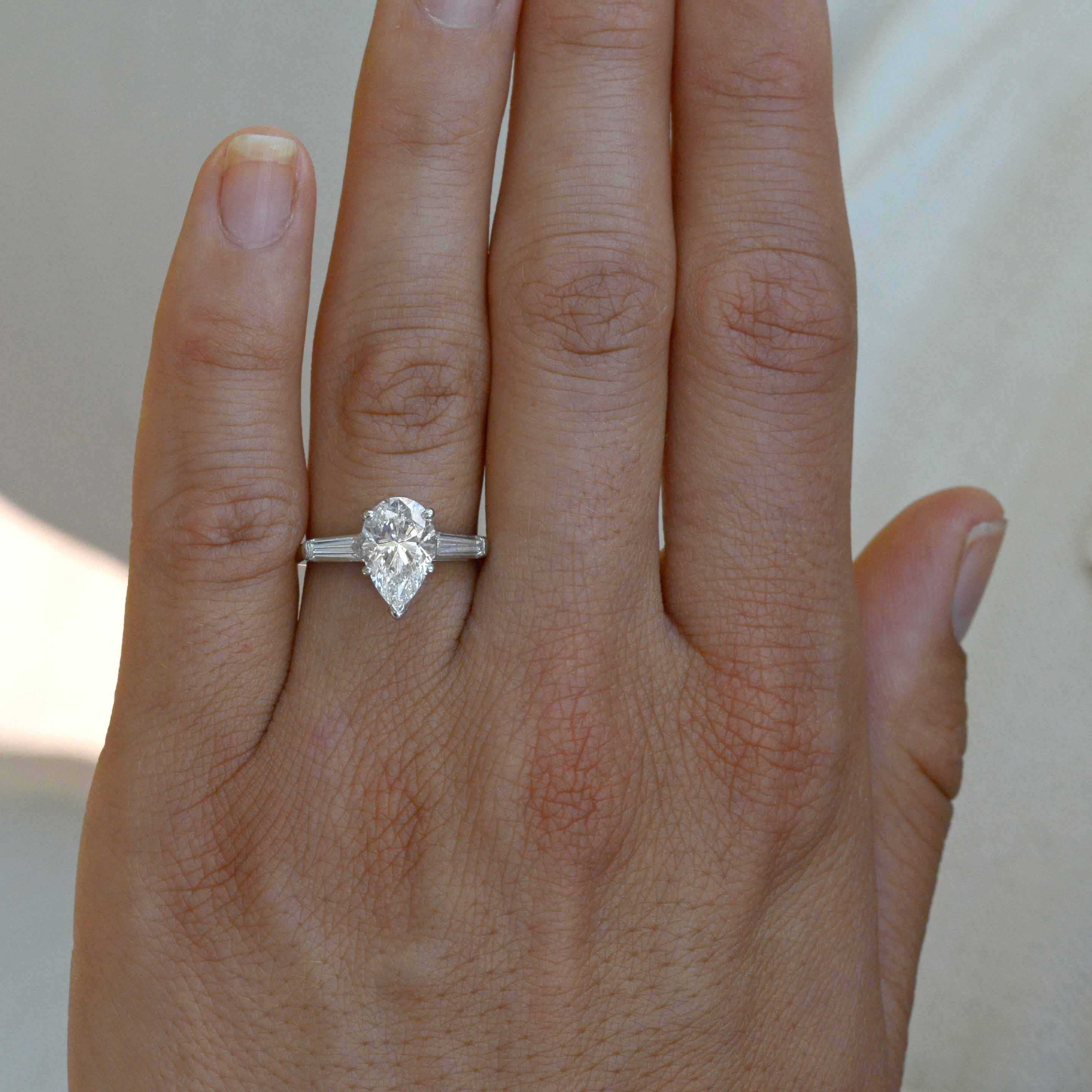 A GIA certified 2 carat natural diamond solitaire engagement ring.